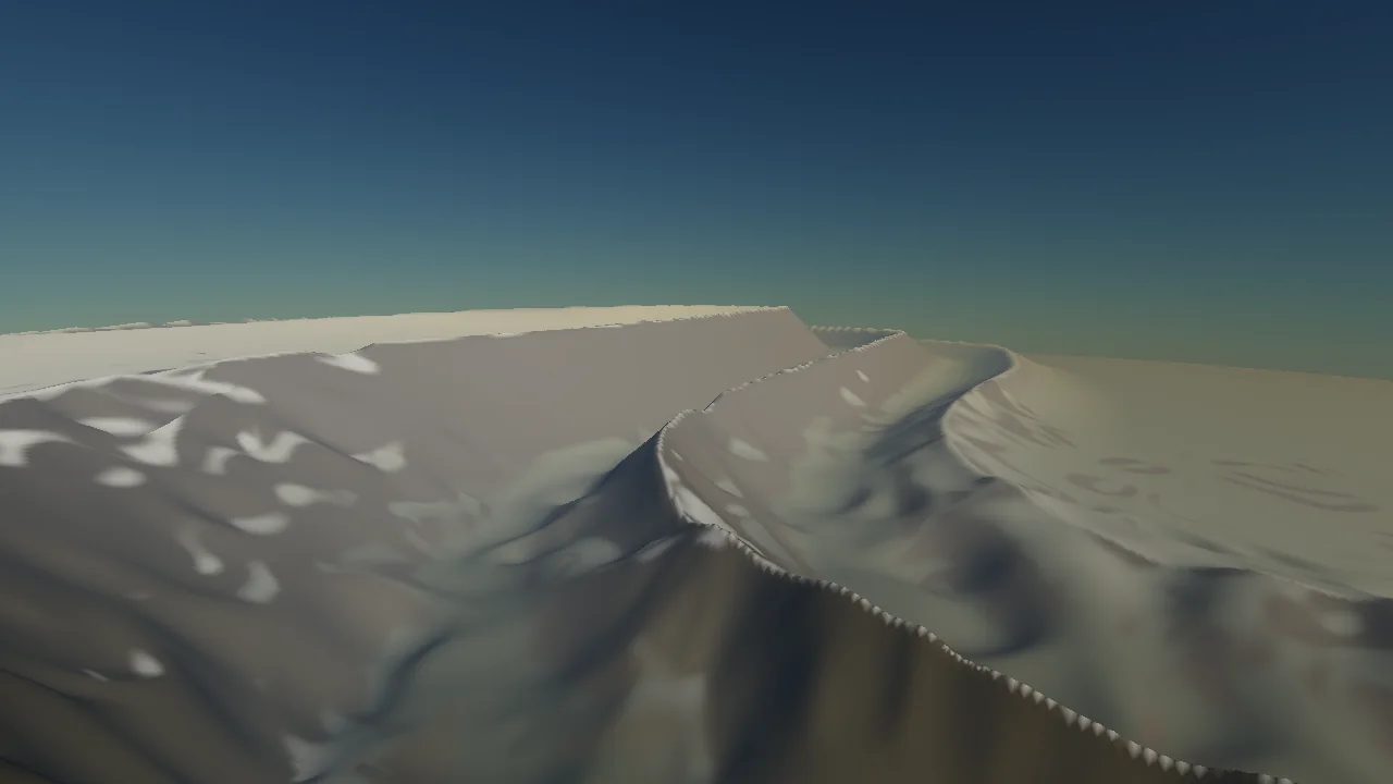 Eine Gebirgskette aus mehreren parallelen Graten mit Laengstaelern dazwischen, aus geringer Flughoehe.